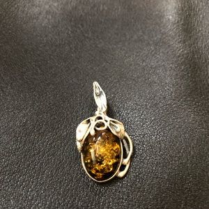 Sterling silver pendant with amber stone
